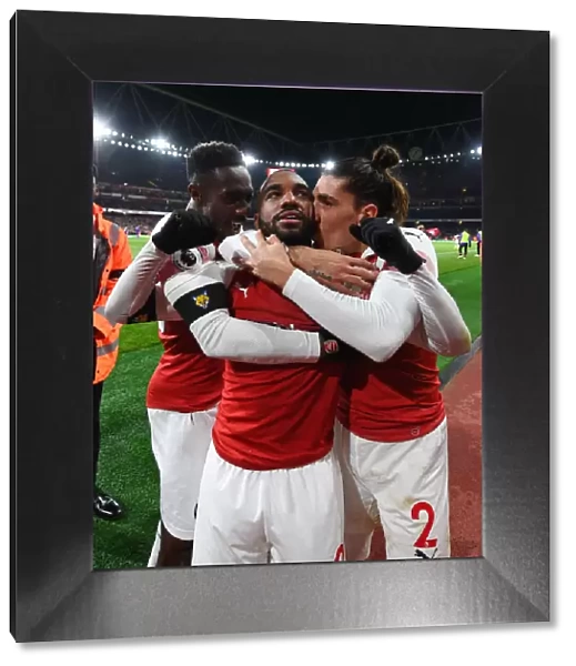 Arsenal's Lacazette, Welbeck, and Bellerin Celebrate Goal Against Liverpool (2018-19)