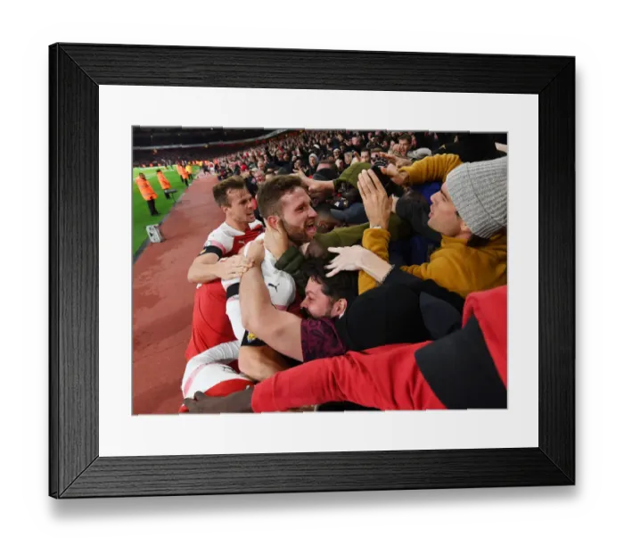 Framed Print : Arsenal Celebrate Goal Against Liverpool: Holding, Mustafi, and Ecstatic Fans Framed Print : Arsenal Celebrate Goal Against Liverpool: Holding, Mustafi, and Ecstatic Fans