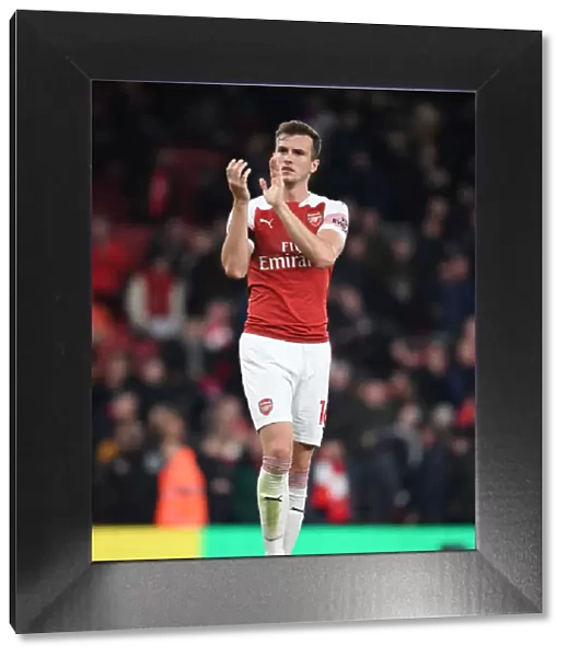 Arsenal's Rob Holding Celebrates with Fans After Hard-Fought Arsenal v Liverpool Match