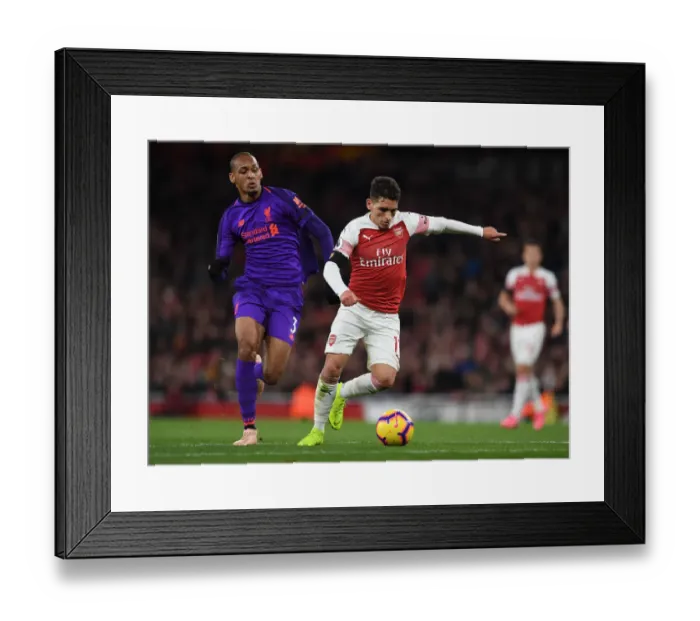 Framed Print : Arsenal's Torreira Takes on Liverpool's Fabinho in Intense Premier League Clash