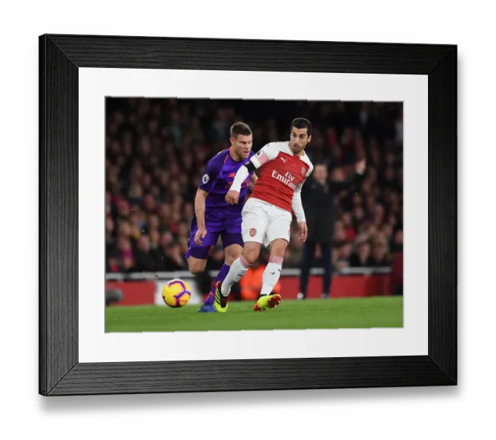 Framed Print : Mkhitaryan vs Milner: A Footballing Battle in the Arsenal vs Liverpool Rivalry Framed Print : Mkhitaryan vs Milner: A Footballing Battle in the Arsenal vs Liverpool Rivalry