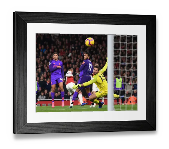 Framed Print : Lacazette Stuns Liverpool: The Moment Arsenal's Star Forward Scores Past Alisson and Co