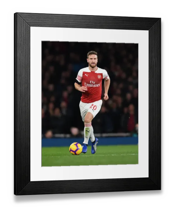 Framed Print : Shkodran Mustafi Focuses in Arsenal's Clash Against Liverpool (2018-19) Framed Print : Shkodran Mustafi Focuses in Arsenal's Clash Against Liverpool (2018-19)