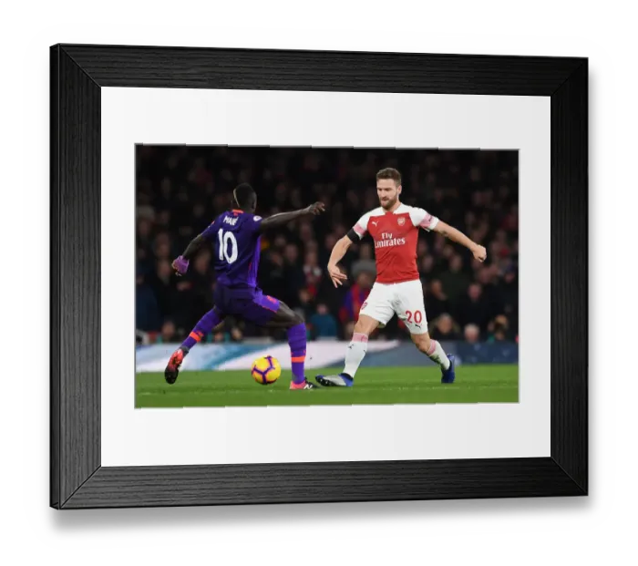 Framed Print : Mustafi vs Mane: Intense Battle at Emirates Stadium - Arsenal vs Liverpool (2018-19) Framed Print : Mustafi vs Mane: Intense Battle at Emirates Stadium - Arsenal vs Liverpool (2018-19)