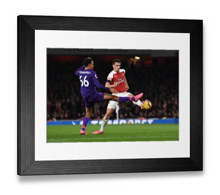 Framed Print : Torreira Takes on Trent-Arnold: Arsenal vs. Liverpool, Premier League Showdown