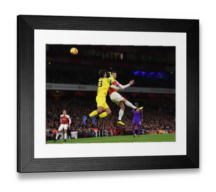 Framed Print : Clash of Titans: Mkhitaryan vs Alisson - Arsenal vs Liverpool, Premier League 2018-19 Framed Print : Clash of Titans: Mkhitaryan vs Alisson - Arsenal vs Liverpool, Premier League 2018-19