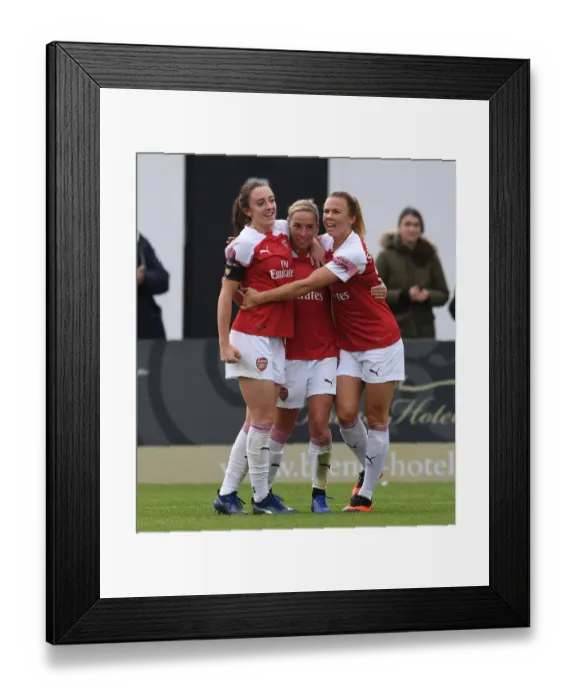 Framed Print : Arsenal Women's Triumph: Nobbs, Evans, and Samuelsson Celebrate Hat-Trick Against Birmingham City