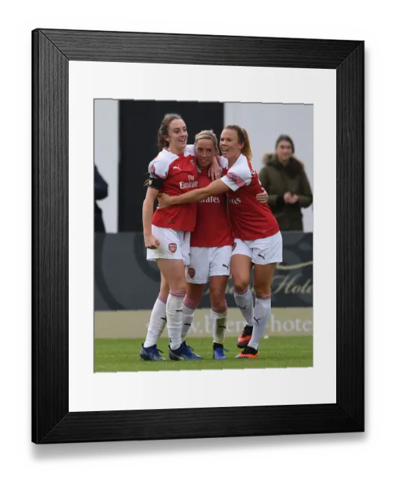 Framed Print : Arsenal Women's Triumph: Nobbs, Evans, and Samuelsson Celebrate Hat-Trick Goals