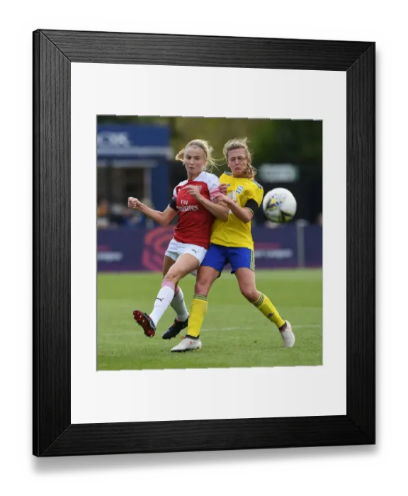 Framed Print : Leah Williamson vs. Kerys Harrop: A Battle in the WSL: Arsenal Women vs. Birmingham City Ladies