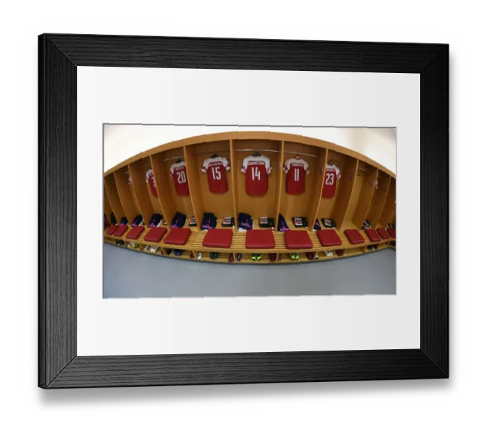 Framed Print : Unity in Arsenal's Changing Room Before Europa League Match vs. Sporting CP