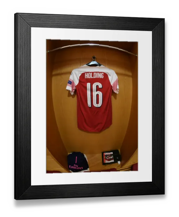 Framed Print : Arsenal Changing Room: Rob Holding's Jersey Awaits before Arsenal vs Sporting CP, UEFA Europa League