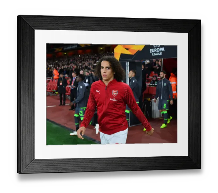 Framed Print : Matteo Guendouzi: Arsenal's Determined Midfielder in Europa League Clash Against Sporting CP Framed Print : Matteo Guendouzi: Arsenal's Determined Midfielder in Europa League Clash Against Sporting CP