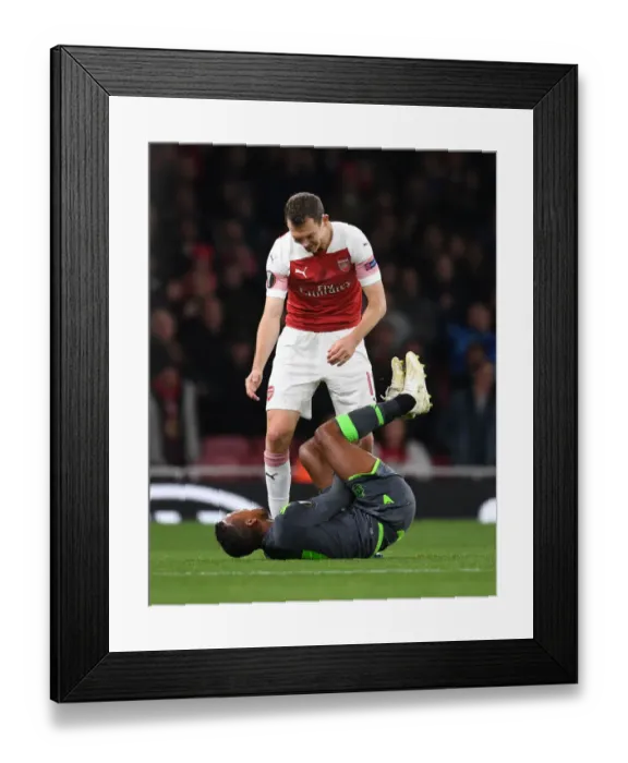 Framed Print : Arsenal vs. Sporting CP: Clash between Lichtsteiner and Nani in Europa League Group E