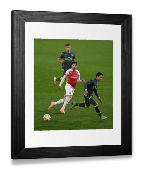 Framed Print : Arsenal's Mkhitaryan Fends Off Acuna Pressure in Europa League Clash Framed Print : Arsenal's Mkhitaryan Fends Off Acuna Pressure in Europa League Clash