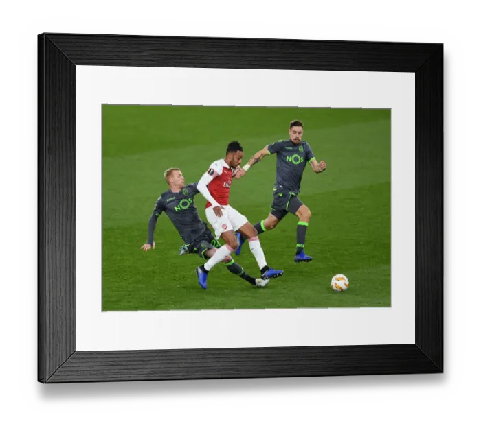 Framed Print : Aubameyang Tripped by Mathieu in Arsenal vs. Sporting Europa League Clash