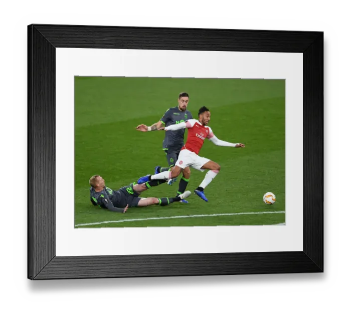 Framed Print : Aubameyang vs Mathieu: Clash in Arsenal's Europa League Battle against Sporting CP Framed Print : Aubameyang vs Mathieu: Clash in Arsenal's Europa League Battle against Sporting CP