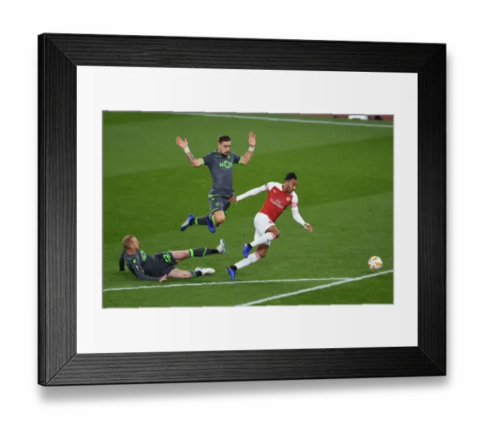 Framed Print : Aubameyang Tripped by Mathieu in Arsenal vs. Sporting Europa League Match Framed Print : Aubameyang Tripped by Mathieu in Arsenal vs. Sporting Europa League Match
