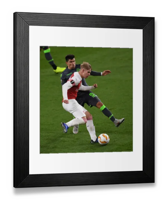 Framed Print : Acuna vs. Smith Rowe: Intense Clash in Arsenal's Europa League Battle Against Sporting CP