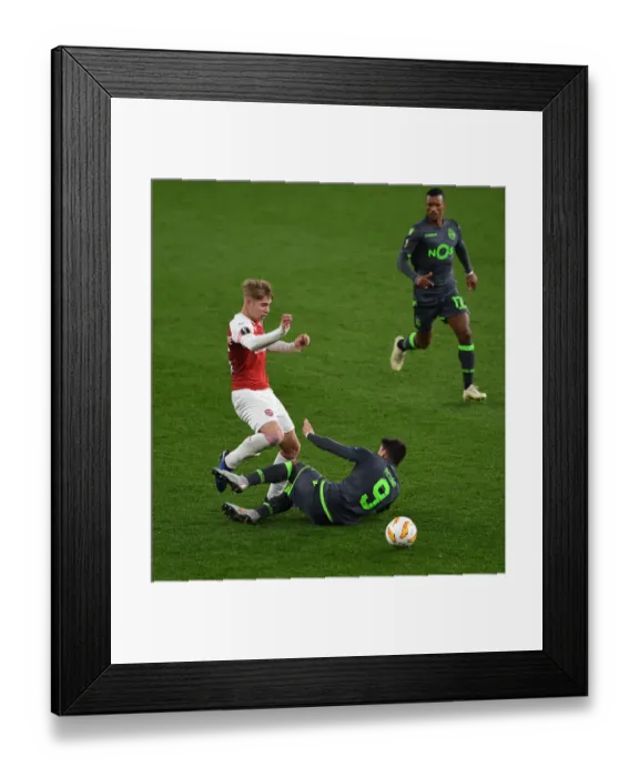 Framed Print : Acuna's Tripping Point: Smith Rowe Disrupted in Arsenal's Europa League Battle vs. Sporting CP