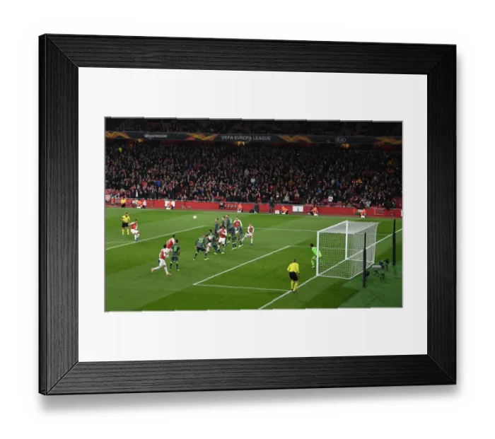 Framed Print : Aubameyang Takes Free Kick for Arsenal in Europa League Clash vs Sporting CP