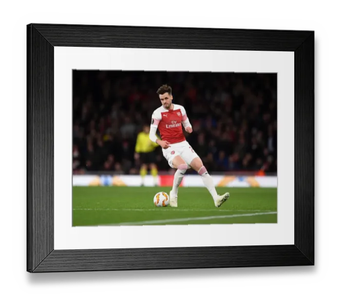 Framed Print : Arsenal's Carl Jenkinson in Action against Sporting CP in the Europa League Framed Print : Arsenal's Carl Jenkinson in Action against Sporting CP in the Europa League