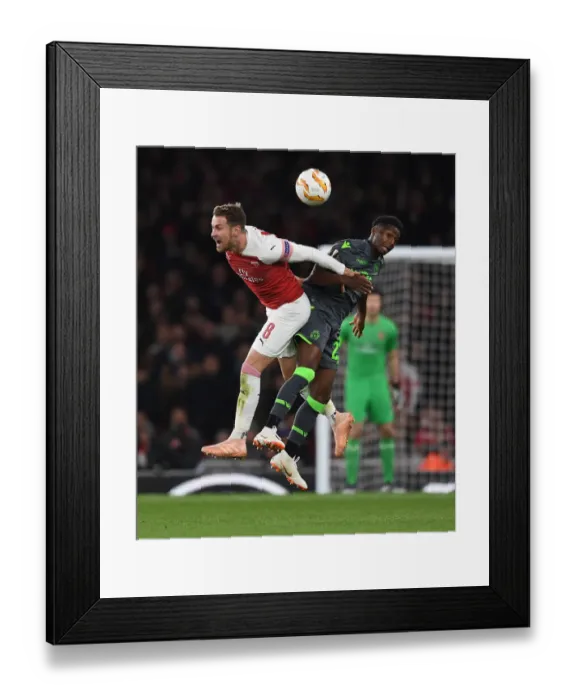 Framed Print : Clash of Champions: Ramsey vs. Diaby in Arsenal's Europa League Battle Framed Print : Clash of Champions: Ramsey vs. Diaby in Arsenal's Europa League Battle
