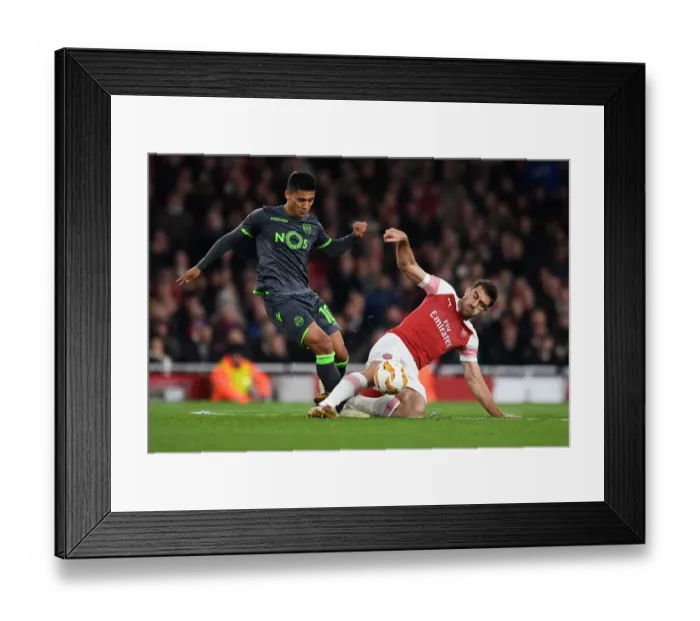 Framed Print : Sokratis vs. Montero: Clash in the Europa League Between Arsenal and Sporting CP Framed Print : Sokratis vs. Montero: Clash in the Europa League Between Arsenal and Sporting CP