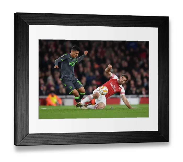Framed Print : Sokratis vs. Montero: Battle in the Europa League - Arsenal vs. Sporting CP