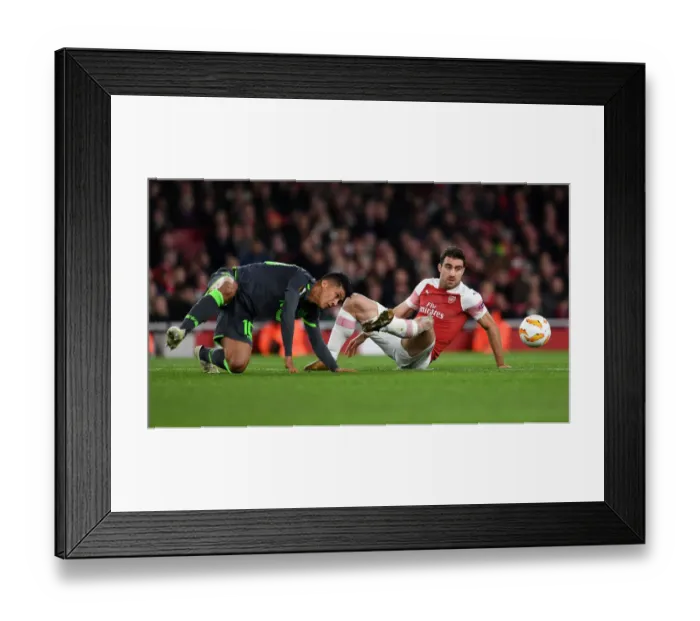 Framed Print : Sokratis vs. Montero: A Europa League Battle at Emirates Stadium Framed Print : Sokratis vs. Montero: A Europa League Battle at Emirates Stadium