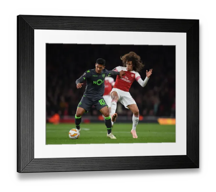 Framed Print : Arsenal vs. Sporting CP: Matteo Guendouzi vs. Fredy Montero - UEFA Europa League Clash Framed Print : Arsenal vs. Sporting CP: Matteo Guendouzi vs. Fredy Montero - UEFA Europa League Clash