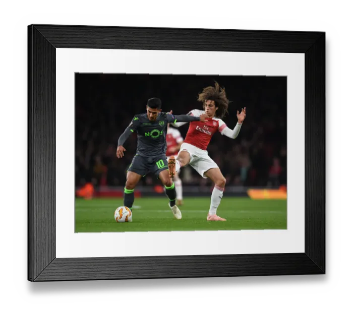 Framed Print : Guendouzi vs Montero: Clash in the Europa League between Arsenal and Sporting CP Framed Print : Guendouzi vs Montero: Clash in the Europa League between Arsenal and Sporting CP