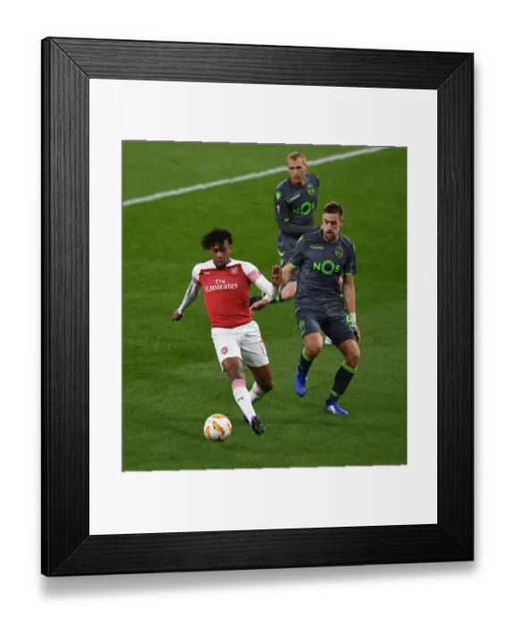Framed Print : Clash of Forces: Iwobi vs. Coates in Arsenal's Europa League Battle