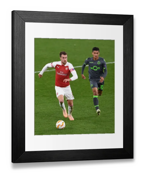 Framed Print : Intense Showdown: Ramsey vs. Montero in Arsenal's Europa League Battle Framed Print : Intense Showdown: Ramsey vs. Montero in Arsenal's Europa League Battle