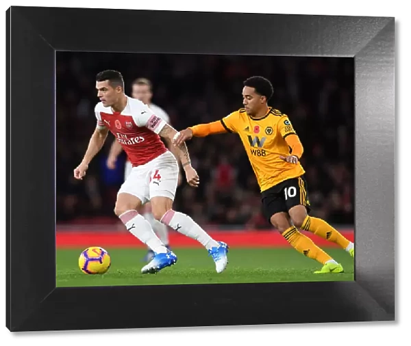 Xhaka vs Costa: Intense Battle Between Arsenal's Granit Xhaka and Wolverhampton Wanderers Helder Costa in Premier League Clash