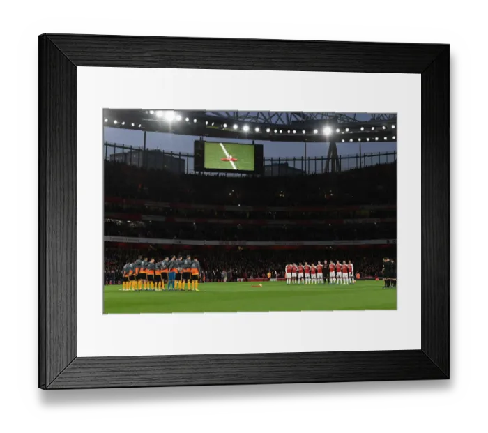 Framed Print : Arsenal and Wolves Players Honor Minutes Silence Before Premier League Clash (2018-19) Framed Print : Arsenal and Wolves Players Honor Minutes Silence Before Premier League Clash (2018-19)