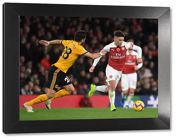 Torreira Takes On Moutinho: Intense Battle in Arsenal vs. Wolverhampton Premier League Clash