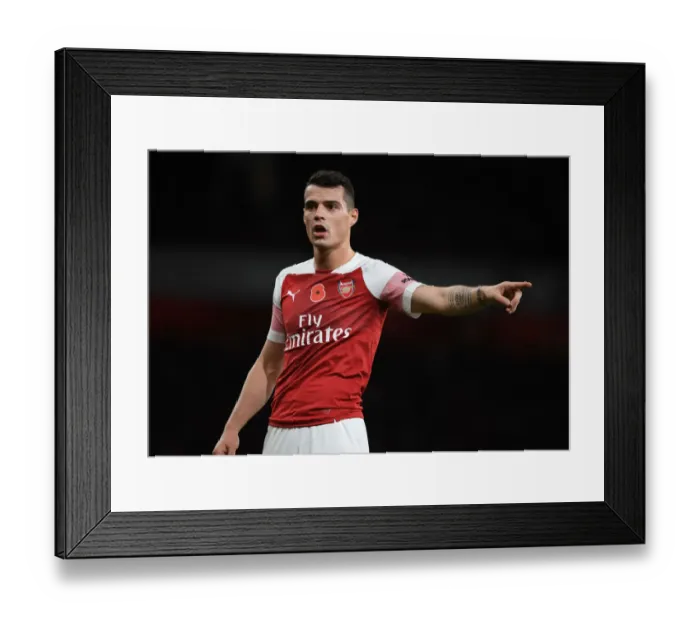 Framed Print : Granit Xhaka: Arsenal Midfielder in Action Framed Print : Granit Xhaka: Arsenal Midfielder in Action