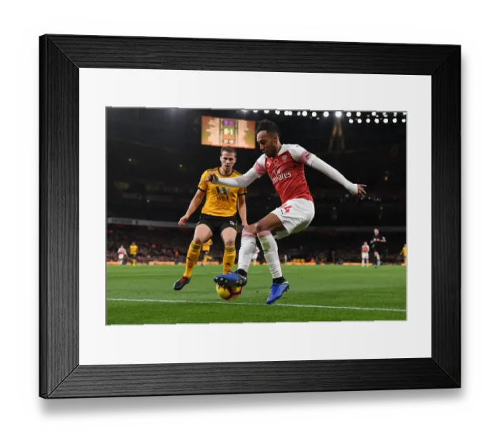 Framed Print : Arsenal's Aubameyang Clashes with Wolves Bennett in Premier League Showdown Framed Print : Arsenal's Aubameyang Clashes with Wolves Bennett in Premier League Showdown