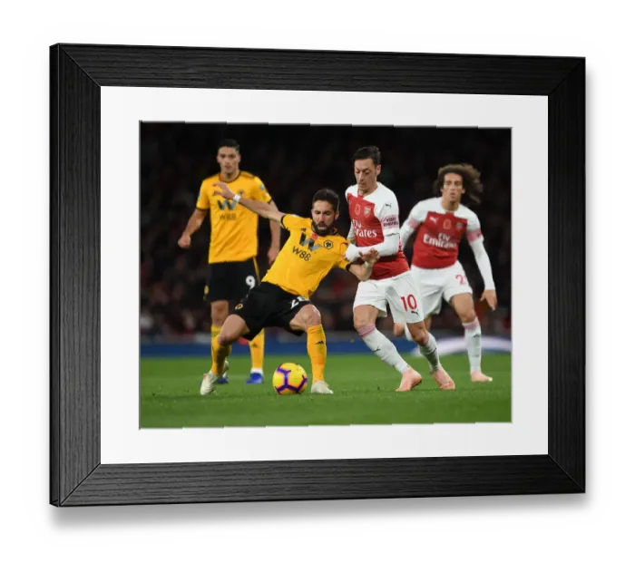 Framed Print : Arsenal's Mesut Özil Clashes with João Moutinho in Premier League Showdown (Arsenal v Wolverhampton Wanderers, 2018-19)