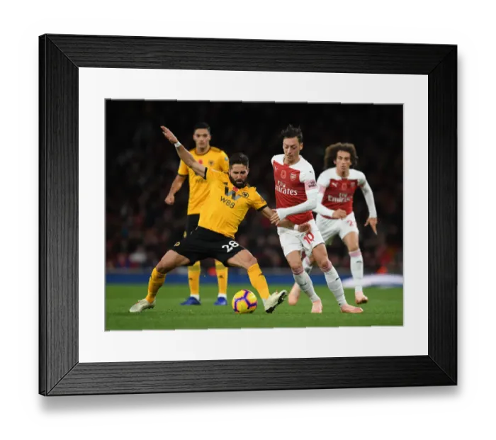Framed Print : Arsenal's Mesut Ozil Clashes with Wolves Joao Moutinho in Premier League Showdown Framed Print : Arsenal's Mesut Ozil Clashes with Wolves Joao Moutinho in Premier League Showdown