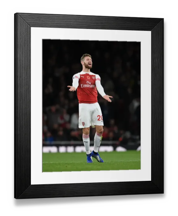 Framed Print : Mustafi's Unyielding Spirit: Arsenal's Defensive Wall vs. Wolverhampton Wanderers