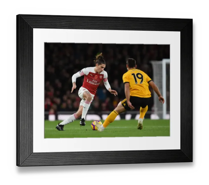 Framed Print : Clash of Forces: Bellerin vs. Castro in Intense Arsenal vs. Wolves Showdown