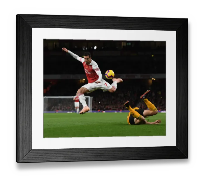 Framed Print : Arsenal's Mkhitaryan Clashes with Wolves Bennett in Premier League Showdown