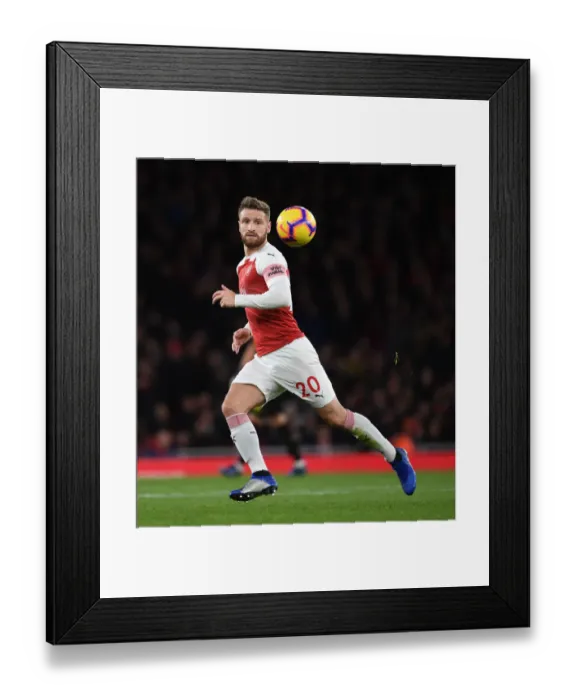 Framed Print : Shkodran Mustafi Focuses in Arsenal's Clash Against Wolverhampton Wanderers Framed Print : Shkodran Mustafi Focuses in Arsenal's Clash Against Wolverhampton Wanderers