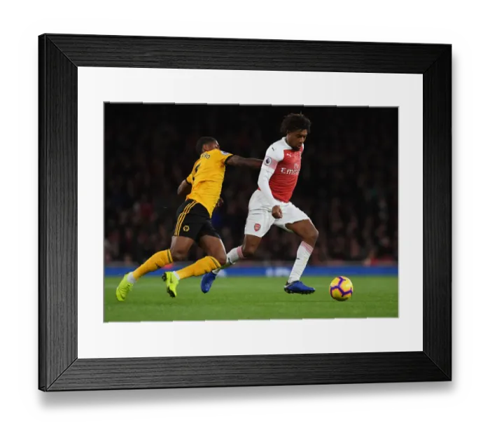 Framed Print : Arsenal's Alex Iwobi Outmaneuvers Wolverhampton's Ivan Cavaleiro Framed Print : Arsenal's Alex Iwobi Outmaneuvers Wolverhampton's Ivan Cavaleiro