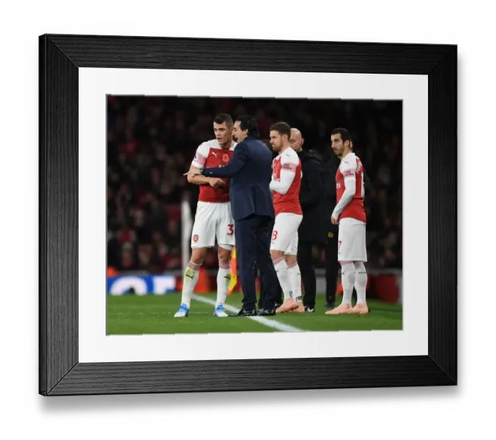 Framed Print : Unai Emery Coaches Granit Xhaka during Arsenal's Clash against Wolverhampton Wanderers Framed Print : Unai Emery Coaches Granit Xhaka during Arsenal's Clash against Wolverhampton Wanderers