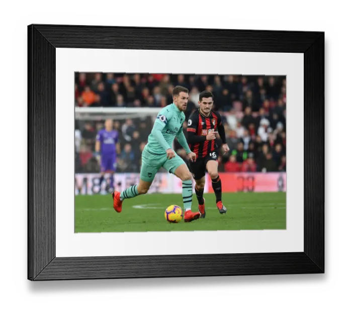 Framed Print : Aaron Ramsey vs. Lewis Cook: Battle in the Premier League - AFC Bournemouth vs. Arsenal FC (2018-19)