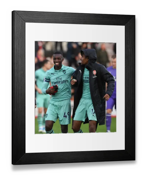 Framed Print : Arsenal's Nketiah and Iwobi Celebrate Victory over Bournemouth