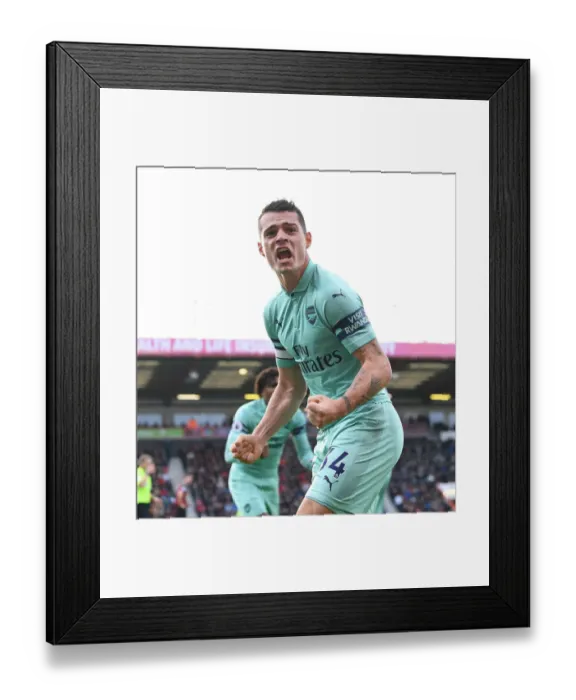 Framed Print : Granit Xhaka's Brace: Arsenal's Game-Changing Moment against AFC Bournemouth (2018-19)