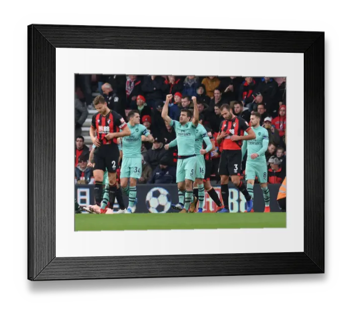 Framed Print : Celebrating Victory: Xhaka and Sokratis of Arsenal FC